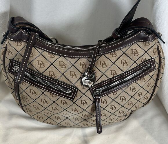 Dooney & Bourke Handbags - Dooney and Dourke Vintage Signature DB Canvas Hobo Bag